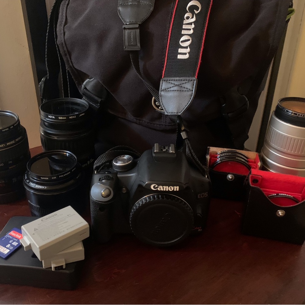 CANON EOS KISS X3 DIGITAL CAMERA W/MULTIPLE LENSES AND MORE